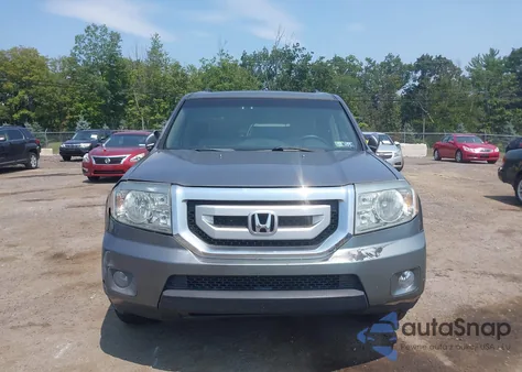 2009 Honda Pilot Touring z USA, uszkodzony, nr VIN 5FNYF48999B020578